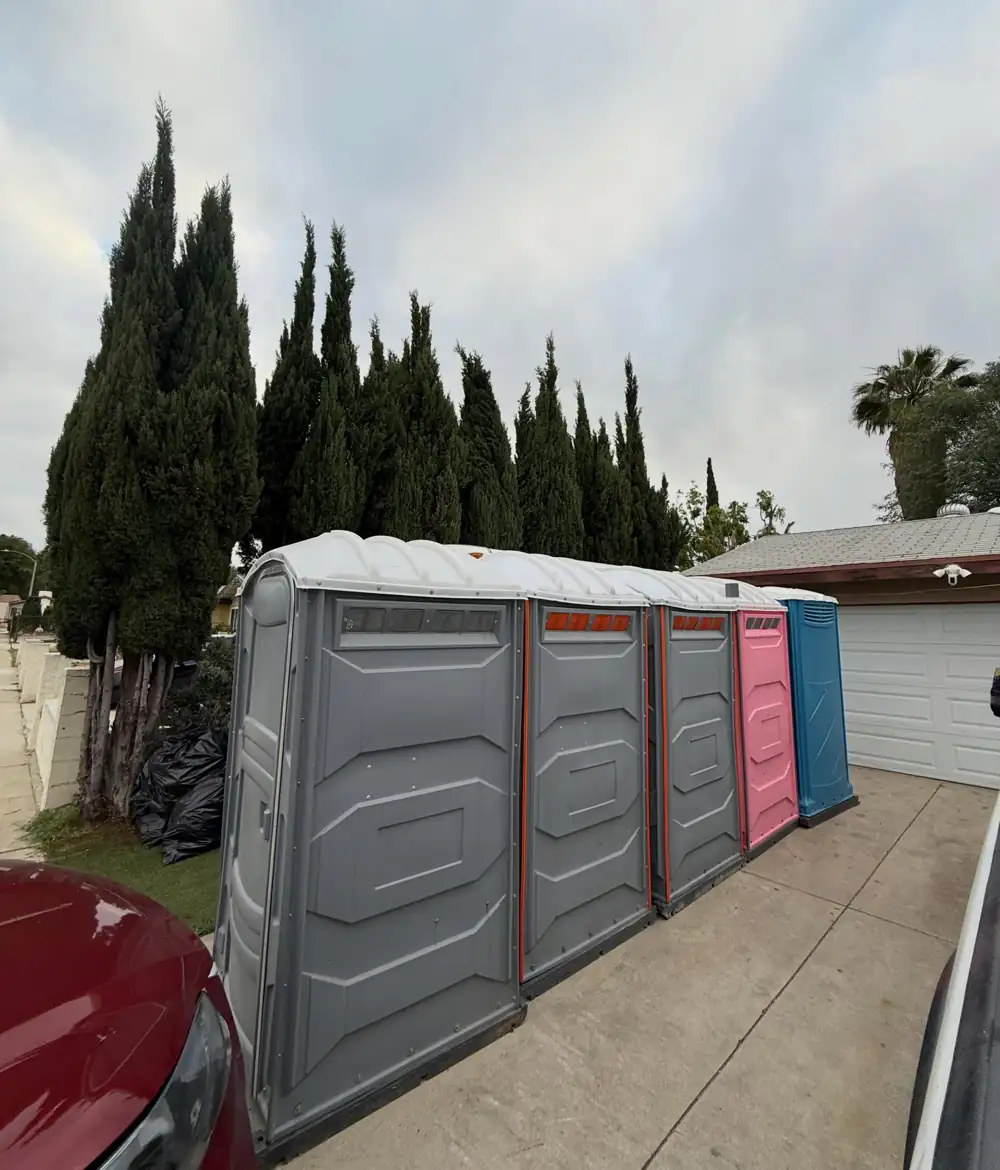 Several portable toilets on a trailer ready for service